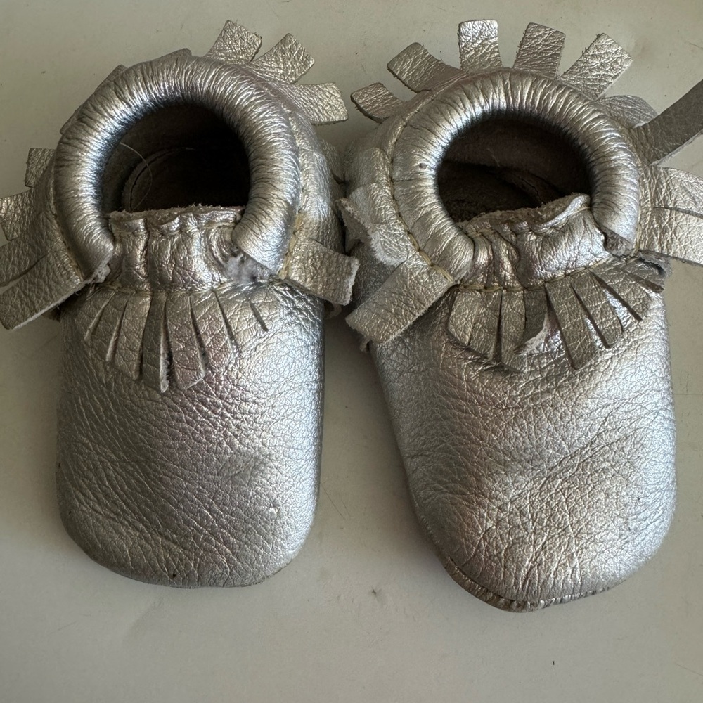 Freshly picked, silver moccasins size 2